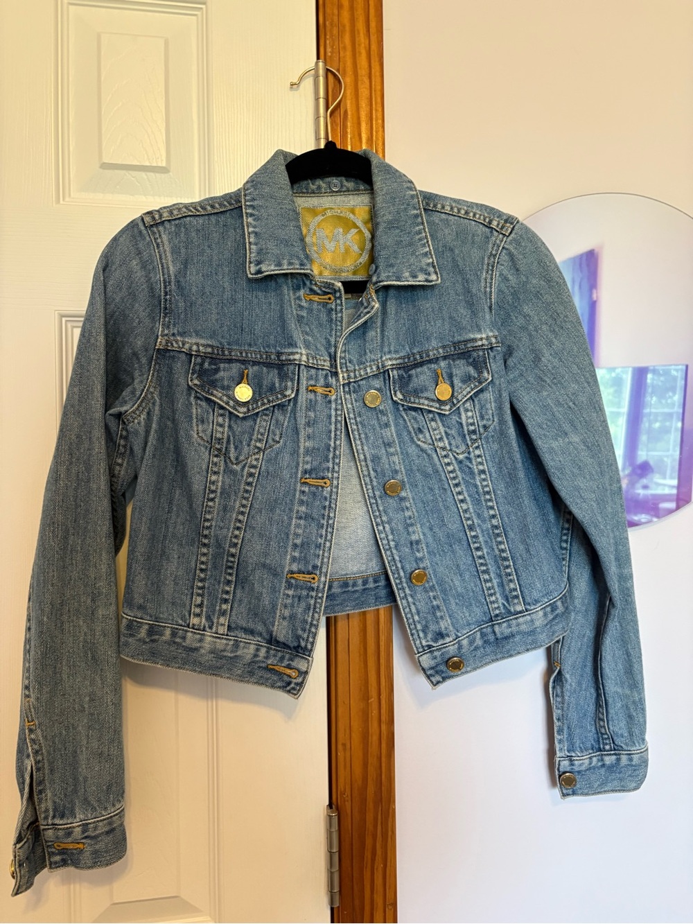 Michael Kors Medium Wash Cropped Denim Jacket with Gold Hardware